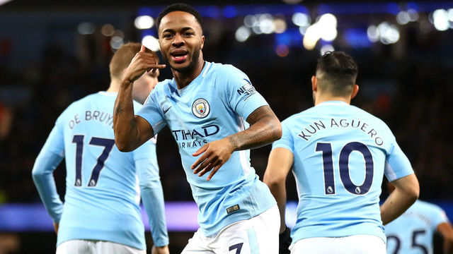 MANCHESTER, ENGLAND - JANUARY 02: Raheem Sterling of Manchester City celebrates after scoring his sides first goal during the Premier League match between Manchester City and Watford at Etihad Stadium on January 2, 2018 in Manchester, England.