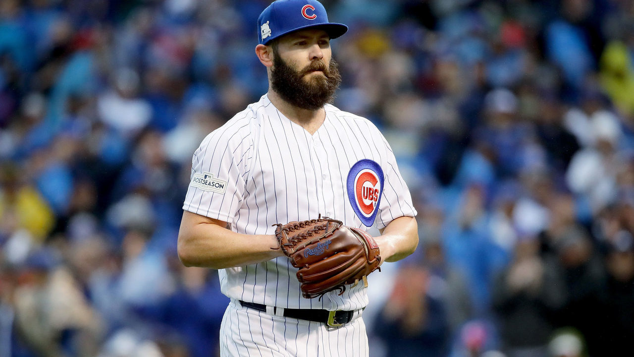 CHICAGO, IL - OCTOBER 11: Jake Arrieta #49 of the Chicago Cubs walks off the field in the second inning during game four of the National League Division Series against the Washington Nationals at Wrigley Field on October 11, 2017 in Chicago, Illinois.