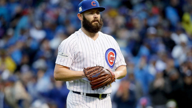 CHICAGO, IL - OCTOBER 11: Jake Arrieta #49 of the Chicago Cubs walks off the field in the second inning during game four of the National League Division Series against the Washington Nationals at Wrigley Field on October 11, 2017 in Chicago, Illinois.