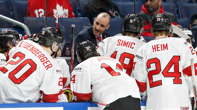 BUFFALO, NY - JANUARY 02: Christian Wohlwend head coach of Switzerland gives instructions during a timeout against Canada in the second period of play in the Quarterfinal IIHF World Junior Championship game at the KeyBank Center on January 2, 2018 in Buffalo, New York.