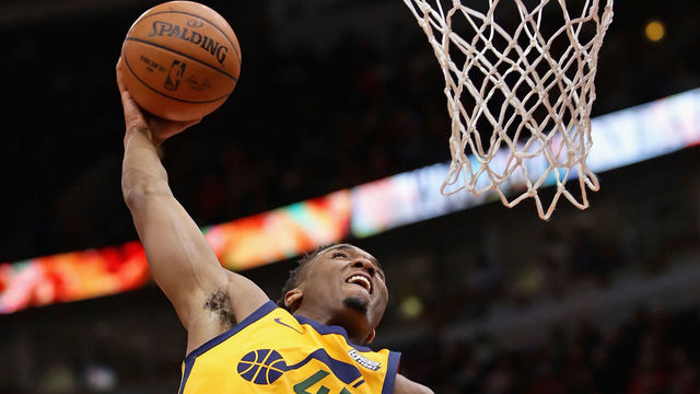 CHICAGO, IL - DECEMBER 13: Donovan Mitchell #45 of the Utah Jazz dunks against the Chicago Bulls at the United Center on December 13, 2017 in Chicago, Illinois. The Bulls defeated the Jazz 103-100.