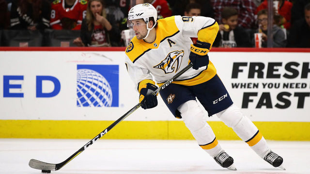 CHICAGO, IL - OCTOBER 14: Filip Forsberg #9 of the Nashville Predators controls the puck against the Chicago Blackhawks at the United Center on October 14, 2017 in Chicago, Illinois. The Blackhawks defeated the Predators 2-1 in overtime.