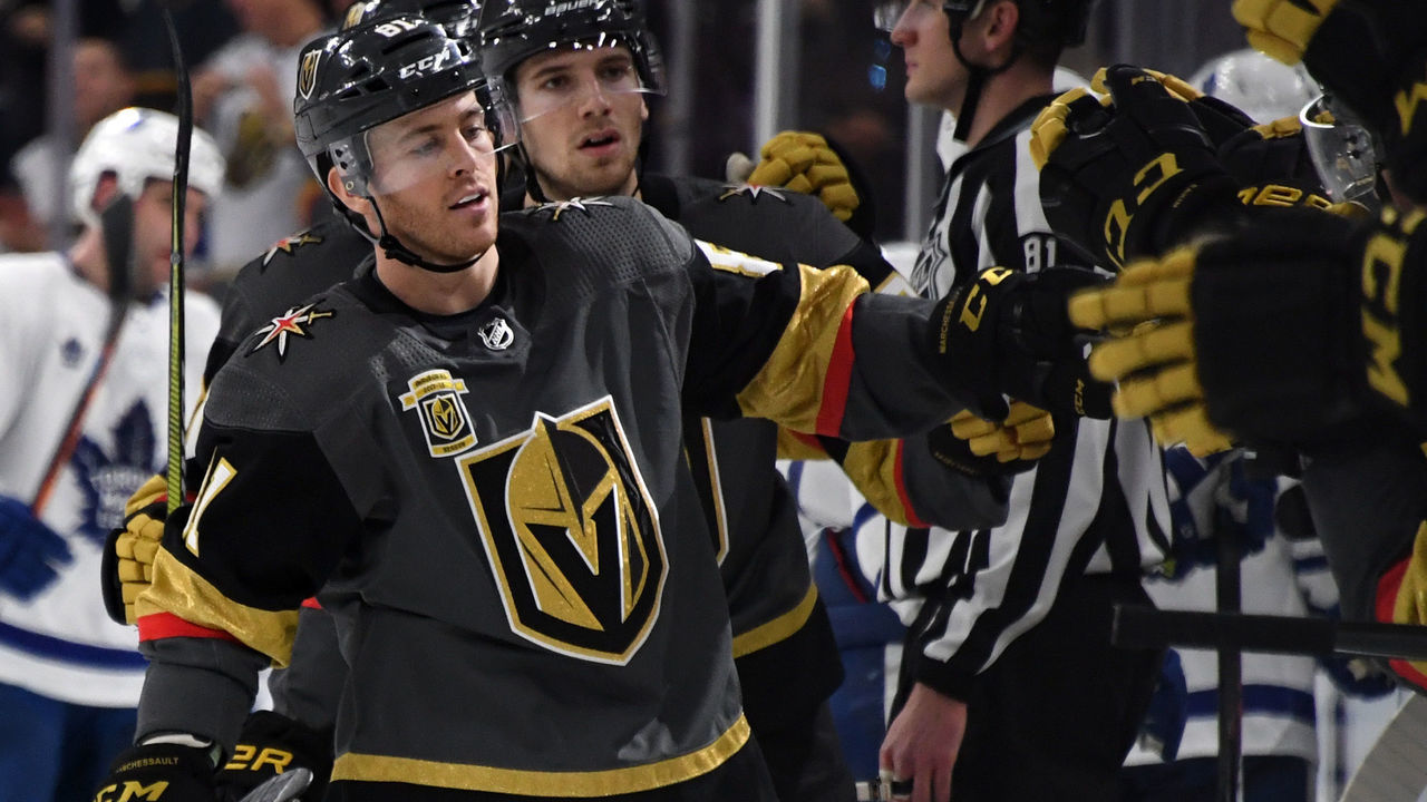 LAS VEGAS, NV - DECEMBER 31: Jonathan Marchessault #81 of the Vegas Golden Knights celebrates with teammates on the bench after scoring a third-period goal against the Toronto Maple Leafs at T-Mobile Arena on December 31, 2017 in Las Vegas, Nevada. The Golden Knights won 6-3.