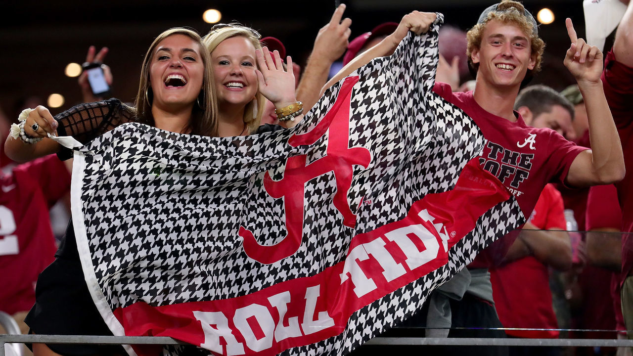 ARLINGTON, TX - SEPTEMBER 03: Alabama Crimson Tide fans celebrate after Alabama scores a touchdown against the USC Trojans in the third quarter during the AdvoCare Classic at AT&T Stadium on September 3, 2016 in Arlington, Texas.