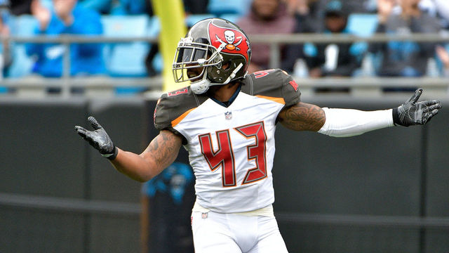 CHARLOTTE, NC - DECEMBER 24: T.J. Ward #43 of the Tampa Bay Buccaneers reacts after a play against the Carolina Panthers in the first quarter at Bank of America Stadium on December 24, 2017 in Charlotte, North Carolina.