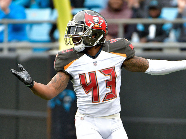 CHARLOTTE, NC - DECEMBER 24: T.J. Ward #43 of the Tampa Bay Buccaneers reacts after a play against the Carolina Panthers in the first quarter at Bank of America Stadium on December 24, 2017 in Charlotte, North Carolina.