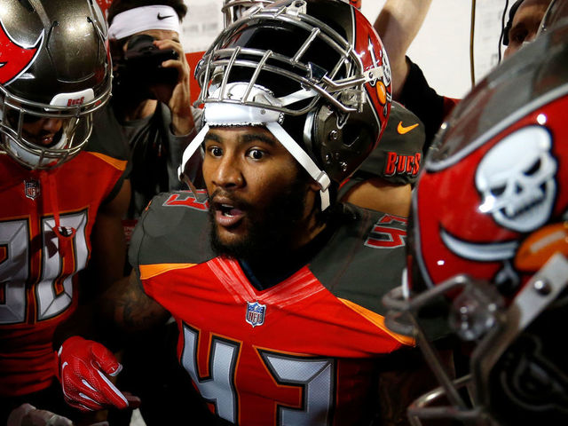 TAMPA, FL - DECEMBER 18: Defensive back T.J. Ward #43 of the Tampa Bay Buccaneers the tunnel to warm up before the start of an NFL football game against the Atlanta Falcons on December 18, 2017 at Raymond James Stadium in Tampa, Florida.