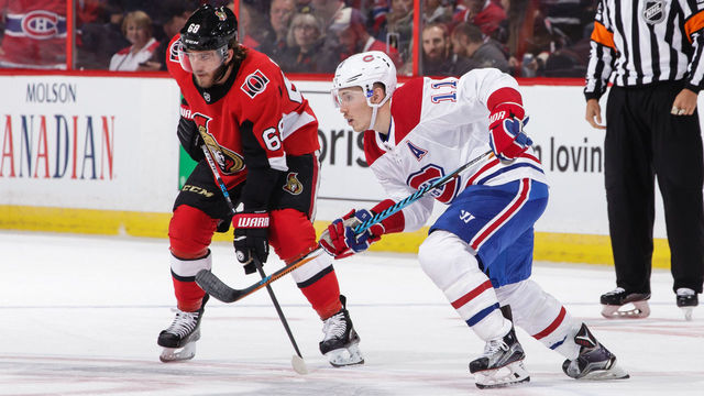 OTTAWA, ON - OCTOBER 30: Mike Hoffman #68 of the Ottawa Senators takes a face-off against Brendan Gallagher #11 of the Montreal Canadiens at Canadian Tire Centre on October 30, 2017 in Ottawa, Ontario, Canada.