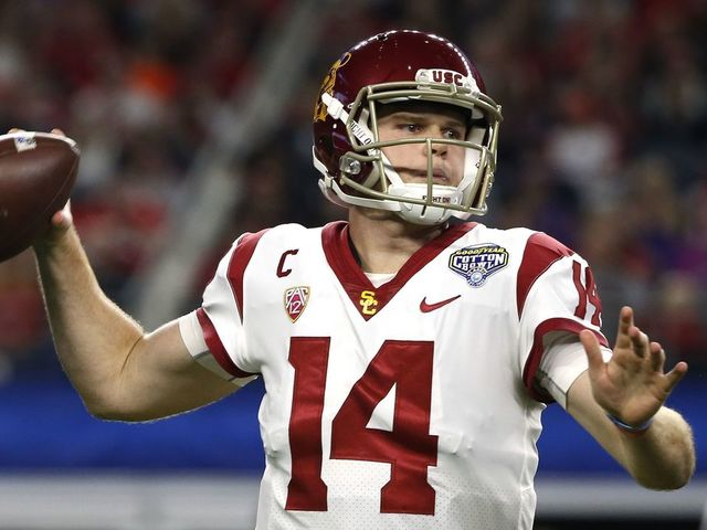 ARLINGTON, TX - DECEMBER 29: Sam Darnold #14 of the USC Trojans looks to throw against the Ohio State Buckeyes in the first half of the 82nd Goodyear Cotton Bowl Classic between USC and Ohio State at AT&T Stadium on December 29, 2017 in Arlington, Texas.