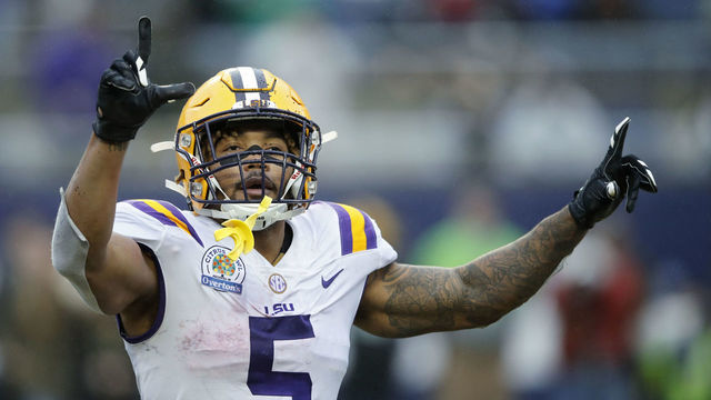 3ORLANDO, FL - JANUARY 01: Derrius Guice #5 of the LSU Tigers reacts after a two-yard reception for touchdown against the Notre Dame Fighting Irish in the fourth quarter of the Citrus Bowl on January 1, 2018 in Orlando, Florida. Notre Dame won 21-17.