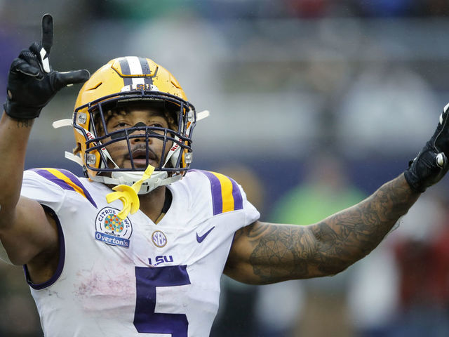 3ORLANDO, FL - JANUARY 01: Derrius Guice #5 of the LSU Tigers reacts after a two-yard reception for touchdown against the Notre Dame Fighting Irish in the fourth quarter of the Citrus Bowl on January 1, 2018 in Orlando, Florida. Notre Dame won 21-17.