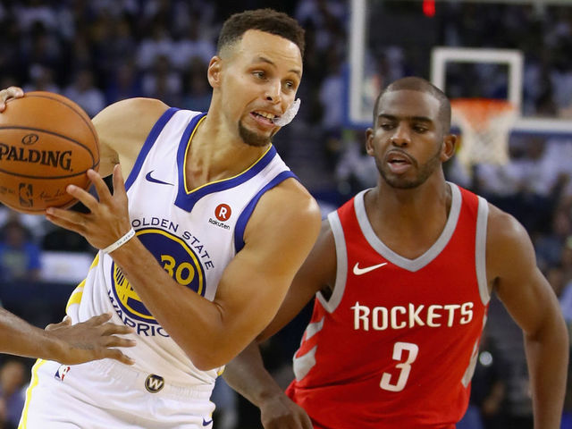 OAKLAND, CA - OCTOBER 17: Stephen Curry #30 of the Golden State Warriors drives on Chris Paul #3 of the Houston Rockets at ORACLE Arena on October 17, 2017 in Oakland, California.