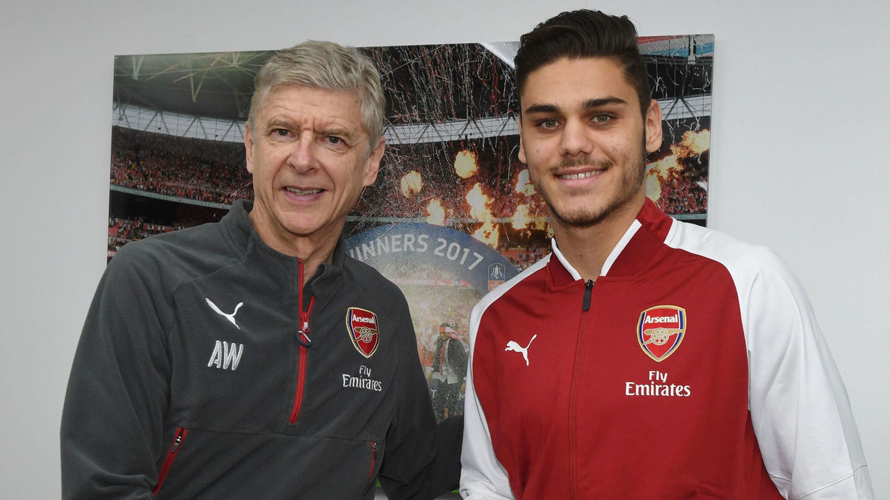 ST ALBANS, ENGLAND - JANUARY 04: New Arsenal signing Konstantinos Mavropanos with manager Arsene Wenger at London Colney on January 4, 2018 in St Albans, England.