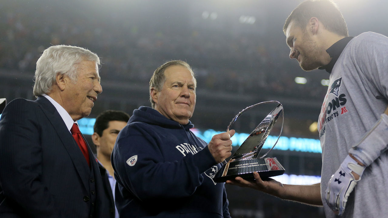 FOXBORO, MA - JANUARY 22: (L-R) Robert Kraft, owner and CEO of the New England Patriots, head coach Bill Belichick of the New England Patriots and Tom Brady #12 celebrate with the Lamar Hunt Trophy after defeating the Pittsburgh Steelers 36-17 to win the AFC Championship Game at Gillette Stadium on January 22, 2017 in Foxboro, Massachusetts.
