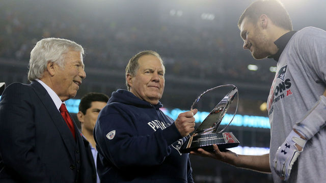 FOXBORO, MA - JANUARY 22: (L-R) Robert Kraft, owner and CEO of the New England Patriots, head coach Bill Belichick of the New England Patriots and Tom Brady #12 celebrate with the Lamar Hunt Trophy after defeating the Pittsburgh Steelers 36-17 to win the AFC Championship Game at Gillette Stadium on January 22, 2017 in Foxboro, Massachusetts.