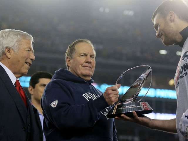 FOXBORO, MA - JANUARY 22: (L-R) Robert Kraft, owner and CEO of the New England Patriots, head coach Bill Belichick of the New England Patriots and Tom Brady #12 celebrate with the Lamar Hunt Trophy after defeating the Pittsburgh Steelers 36-17 to win the AFC Championship Game at Gillette Stadium on January 22, 2017 in Foxboro, Massachusetts.