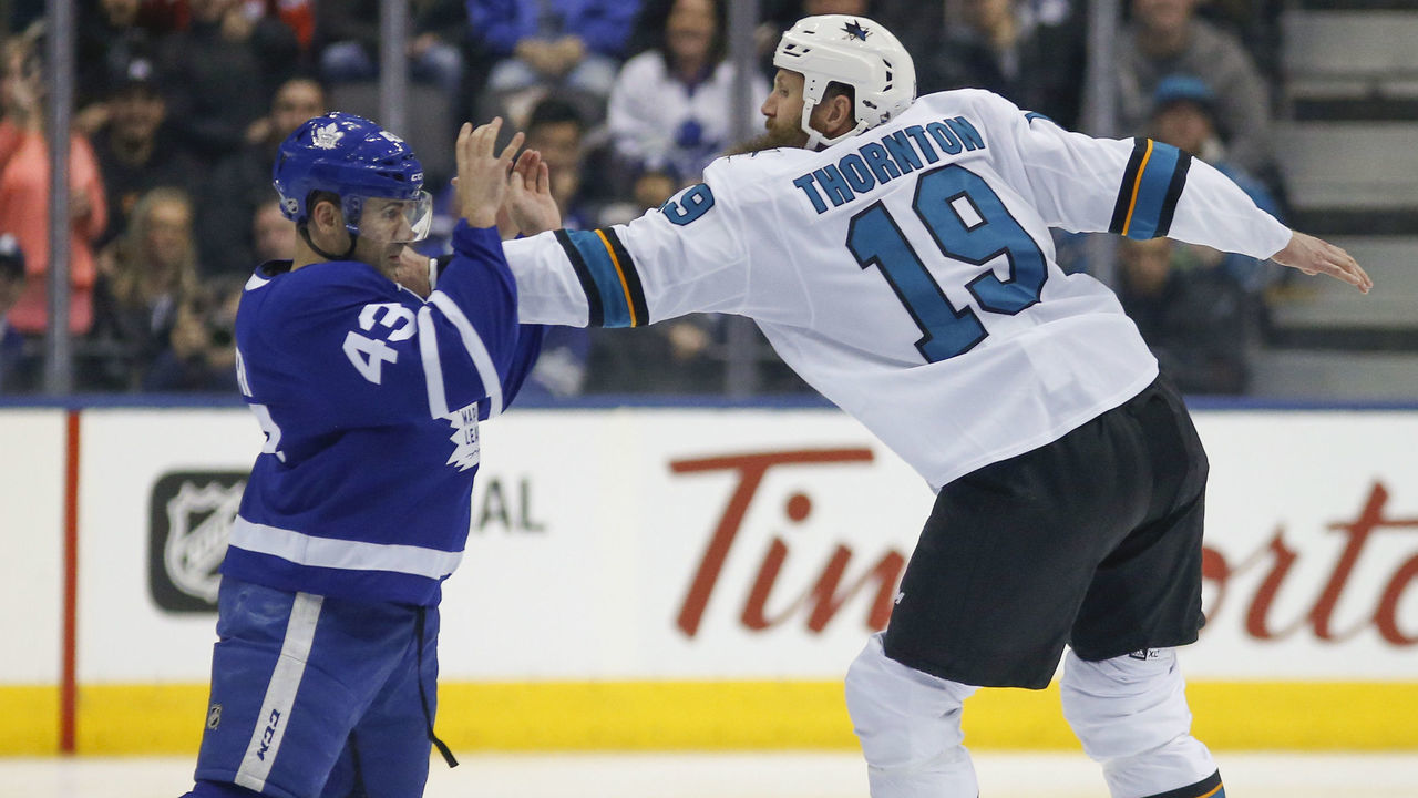 TORONTO, ON - JANUARY 4: The talk began before the puck drop, and the gloves dropped as did the puck. Toronto Maple Leafs center Nazem Kadri (43) and San Jose Sharks center Joe Thornton (19) do a little dance. Toronto Maple Leafs VS San Jose Sharks during 1st period action in NHL regular season play at the Air Canada Centre. Toronto Star/Rick Madonik (Rick Madonik/Toronto Star via Getty Images)
