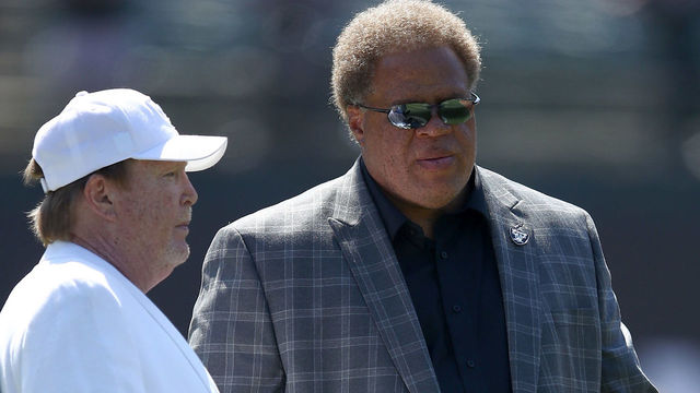 OAKLAND, CA - SEPTEMBER 17: Oakland Raiders general manager Reggie McKenzie talks to Oakland Raiders owner Mark Davis before their game against the New York Jets at Oakland-Alameda County Coliseum on September 17, 2017 in Oakland, California.