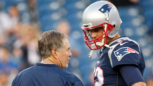 FOXBORO, MA - AUGUST 31: Bill Belichick of the New England Patriots and Tom Brady #12 chat before a preseason game with the New York Giants at Gillette Stadium on August 31, 2017 in Foxboro, Massachusetts.