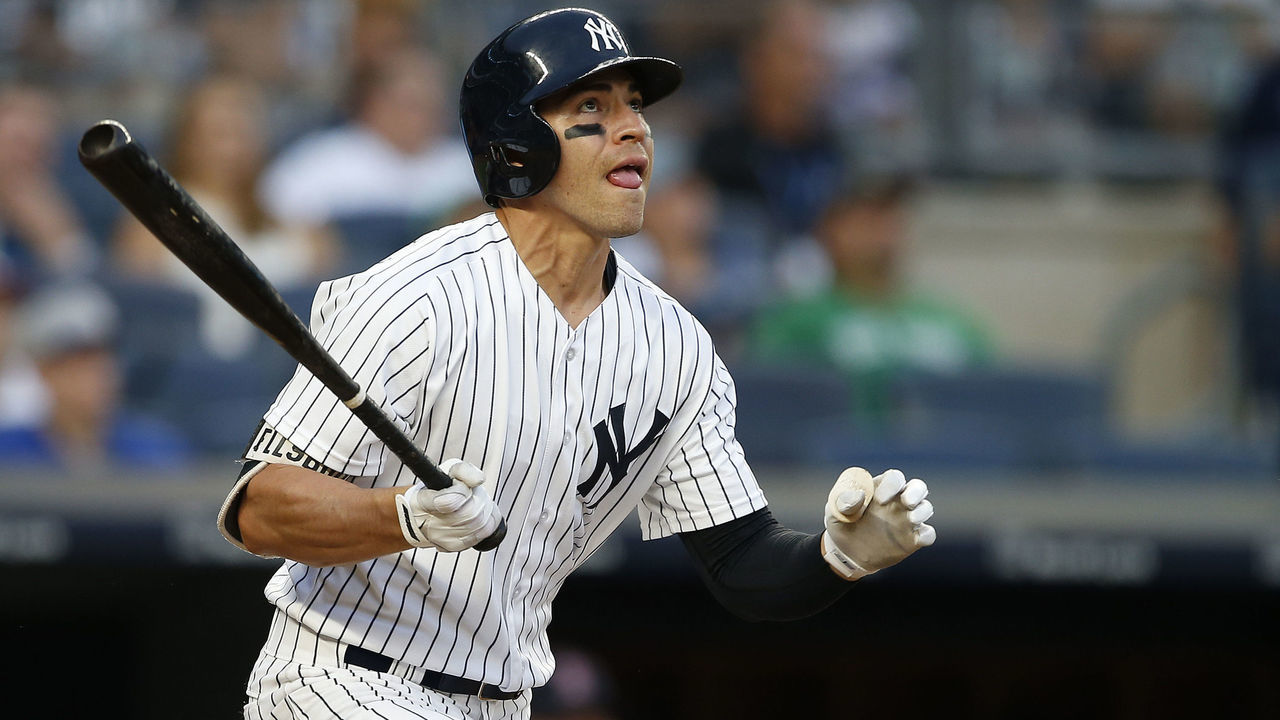 NEW YORK, NY - AUGUST 12: Jacoby Ellsbury #22 of the New York Yankees hits a home run in the ninth inning against the Boston Red Sox during a game at Yankee Stadium on August 12, 2017 in the Bronx borough of New York City. The Red Sox defeated the Yankees 10-5.