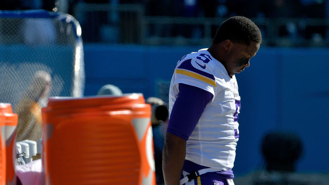 CHARLOTTE, NC - DECEMBER 10: Teddy Bridgewater #5 of the Minnesota Vikings stands by himself near the team bench for the national anthem during their game against the Carolina Panthers at Bank of America Stadium on December 10, 2017 in Charlotte, North Carolina.