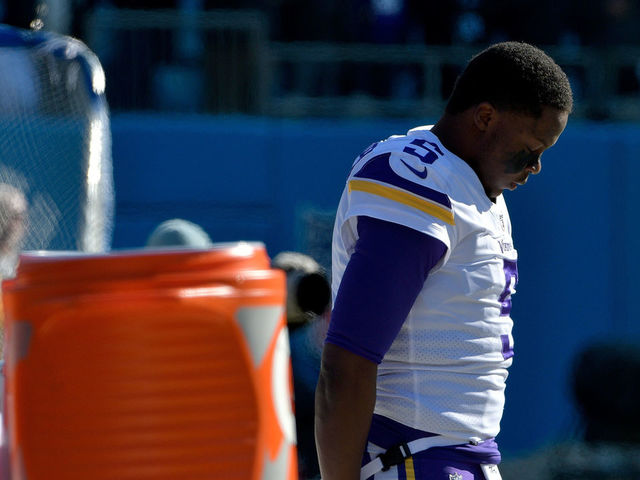 CHARLOTTE, NC - DECEMBER 10: Teddy Bridgewater #5 of the Minnesota Vikings stands by himself near the team bench for the national anthem during their game against the Carolina Panthers at Bank of America Stadium on December 10, 2017 in Charlotte, North Carolina.