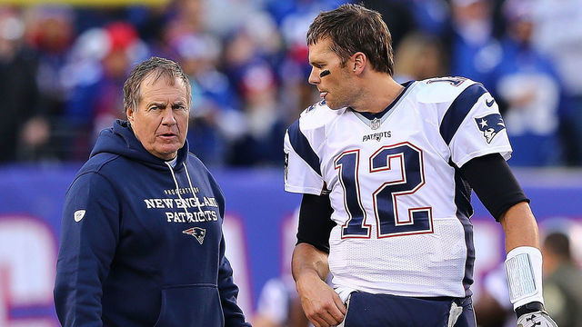 EAST RUTHERFORD, NJ - NOVEMBER 15: Tom Brady #12 of the New England Patriots speaks with head coach Bill Belichick prior to the game against the New York Giants at MetLife Stadium on November 15, 2015 in East Rutherford, New Jersey.