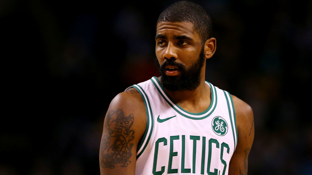 BOSTON, MA - DECEMBER 20: Kyrie Irving #11 of the Boston Celtics looks on during the second quarter against the Miami Heat at TD Garden on December 20, 2017 in Boston, Massachusetts.