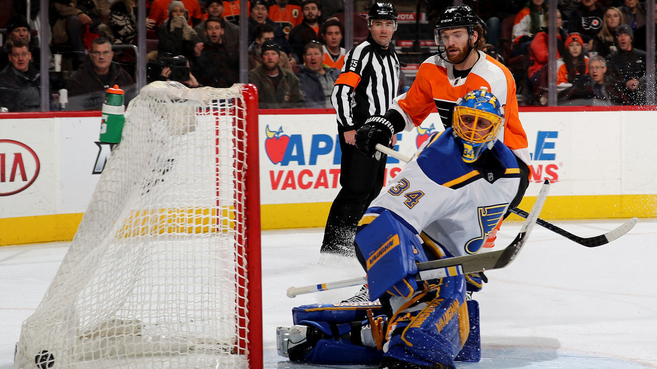 PHILADELPHIA, PA - JANUARY 06: Sean Couturier #14 of the Philadelphia Flyers scores his 20th goal of the season as Jake Allen #34 of the St. Louis Blues looks on in the second period on January 6, 2018 at Wells Fargo Center in Philadelphia, Pennsylvania.