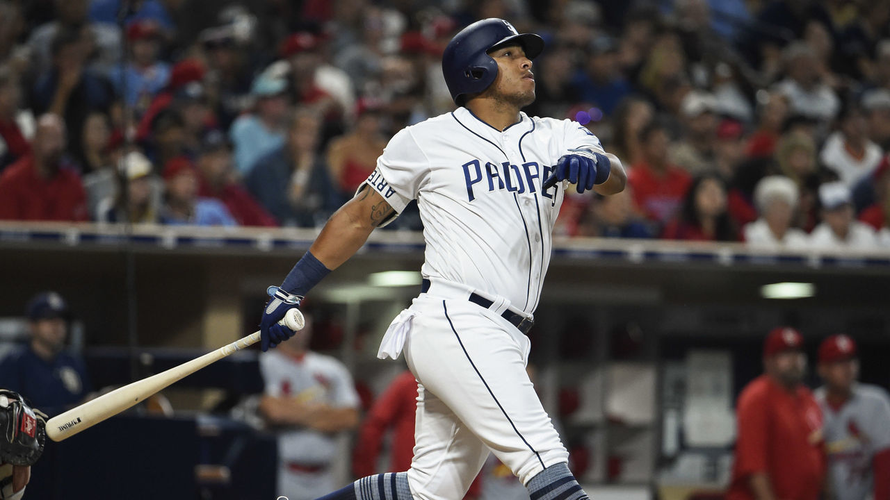 SAN DIEGO, CA - SEPTEMBER 6: Yangervis Solarte #26 of the San Diego Padres hits a solo home run during the fourth inning of a baseball game against the St. Louis Cardinals at PETCO Park on September 6, 2017 in San Diego, California.