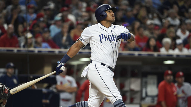 SAN DIEGO, CA - SEPTEMBER 6: Yangervis Solarte #26 of the San Diego Padres hits a solo home run during the fourth inning of a baseball game against the St. Louis Cardinals at PETCO Park on September 6, 2017 in San Diego, California.