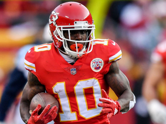 KANSAS CITY, MO - JANUARY 6: Wide receiver Tyreek Hill #10 of the Kansas City Chiefs runs after the catch for a long gain during the first quarter of the AFC Wild Card Playoff game against the Tennessee Titans at Arrowhead Stadium on January 6, 2018 in Kansas City, Missouri.