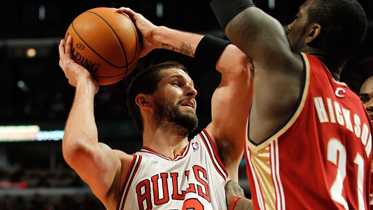 CHICAGO - APRIL 25: Brad Miller #52 of the Chicago Bulls puts up a shot against J.J. Hickson #21 of the Cleveland Cavaliers in Game Four of the Eastern Conference Quarterfinals during the 2010 NBA Playoffs at the United Center on April 25, 2010 in Chicago, Illinois. The Cavaliers defeated the Bulls 121-98. NOTE TO USER: User expressly acknowledges and agrees that, by downloading and/or using this Photograph, User is consenting to the terms and conditions of the Getty Images License Agreement.