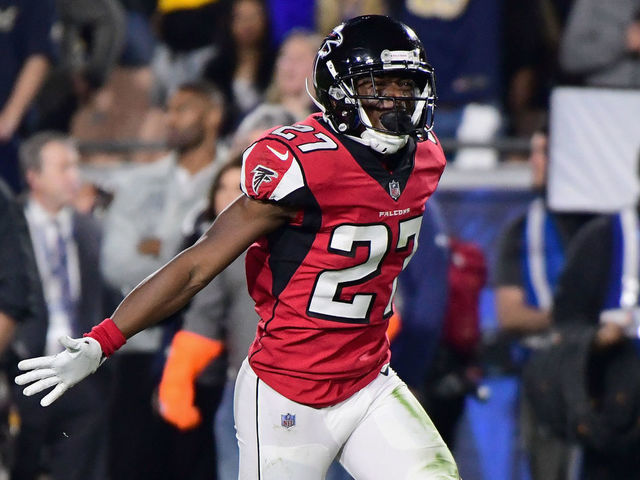 LOS ANGELES, CA - JANUARY 06: Free safety Damontae Kazee #27 of the Atlanta Falcons celebrates a fumble recovery on a kick return during the first quarter of the NFC Wild Card Playoff game against the Los Angeles Rams at Los Angeles Coliseum on January 6, 2018 in Los Angeles, California.