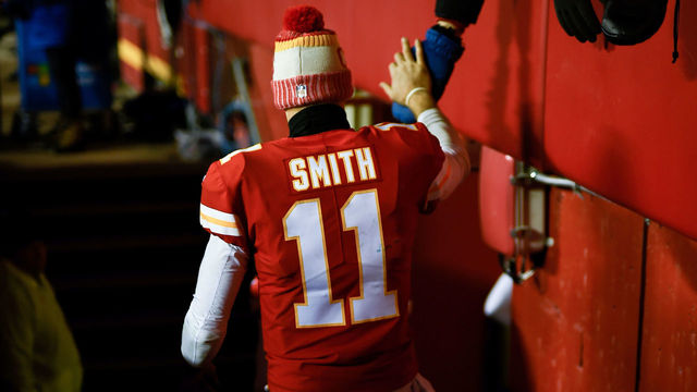 KANSAS CITY, MO - JANUARY 6: Quarterback Alex Smith #11 of the Kansas City Chiefs high fives the crowd as he walks off the field following the loss to the Tennessee Titans after the AFC Wild Card Playoff Game at Arrowhead Stadium on January 6, 2018 in Kansas City, Missouri.