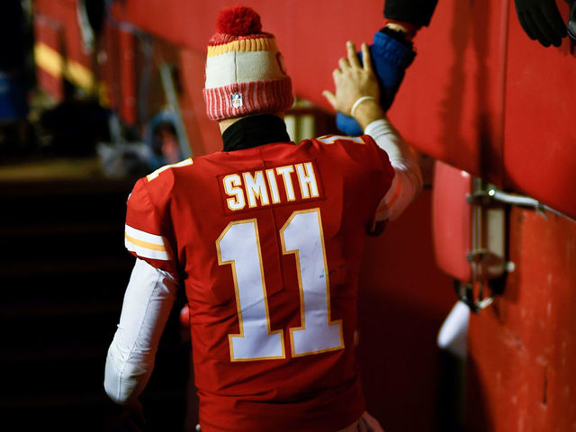 KANSAS CITY, MO - JANUARY 6: Quarterback Alex Smith #11 of the Kansas City Chiefs high fives the crowd as he walks off the field following the loss to the Tennessee Titans after the AFC Wild Card Playoff Game at Arrowhead Stadium on January 6, 2018 in Kansas City, Missouri.