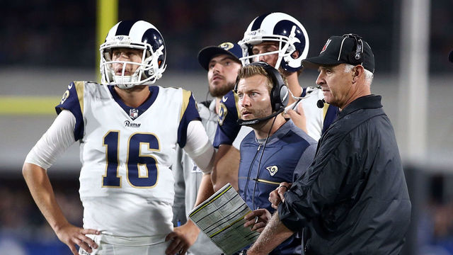 LOS ANGELES, CA - JANUARY 06: Los Angeles Rams coaching staff along with Jared Goff #16 of the Los Angeles Rams wait for a call to be reviewed during the NFC Wild Card Playoff Game against the Atlanta Falcons at the Los Angeles Coliseum on January 6, 2018 in Los Angeles, California.