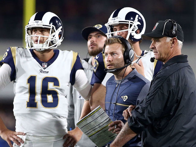 LOS ANGELES, CA - JANUARY 06: Los Angeles Rams coaching staff along with Jared Goff #16 of the Los Angeles Rams wait for a call to be reviewed during the NFC Wild Card Playoff Game against the Atlanta Falcons at the Los Angeles Coliseum on January 6, 2018 in Los Angeles, California.