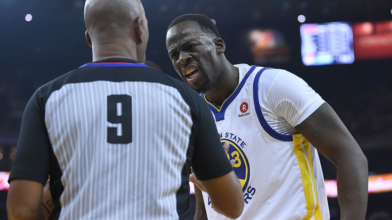 OAKLAND, CA - DECEMBER 25: Draymond Green #23 of the Golden State Warriors complains to referee Derrick Stafford #9 of a no foul call during an NBA basketball game against the Cleveland Cavaliers at ORACLE Arena on December 25, 2017 in Oakland, California.