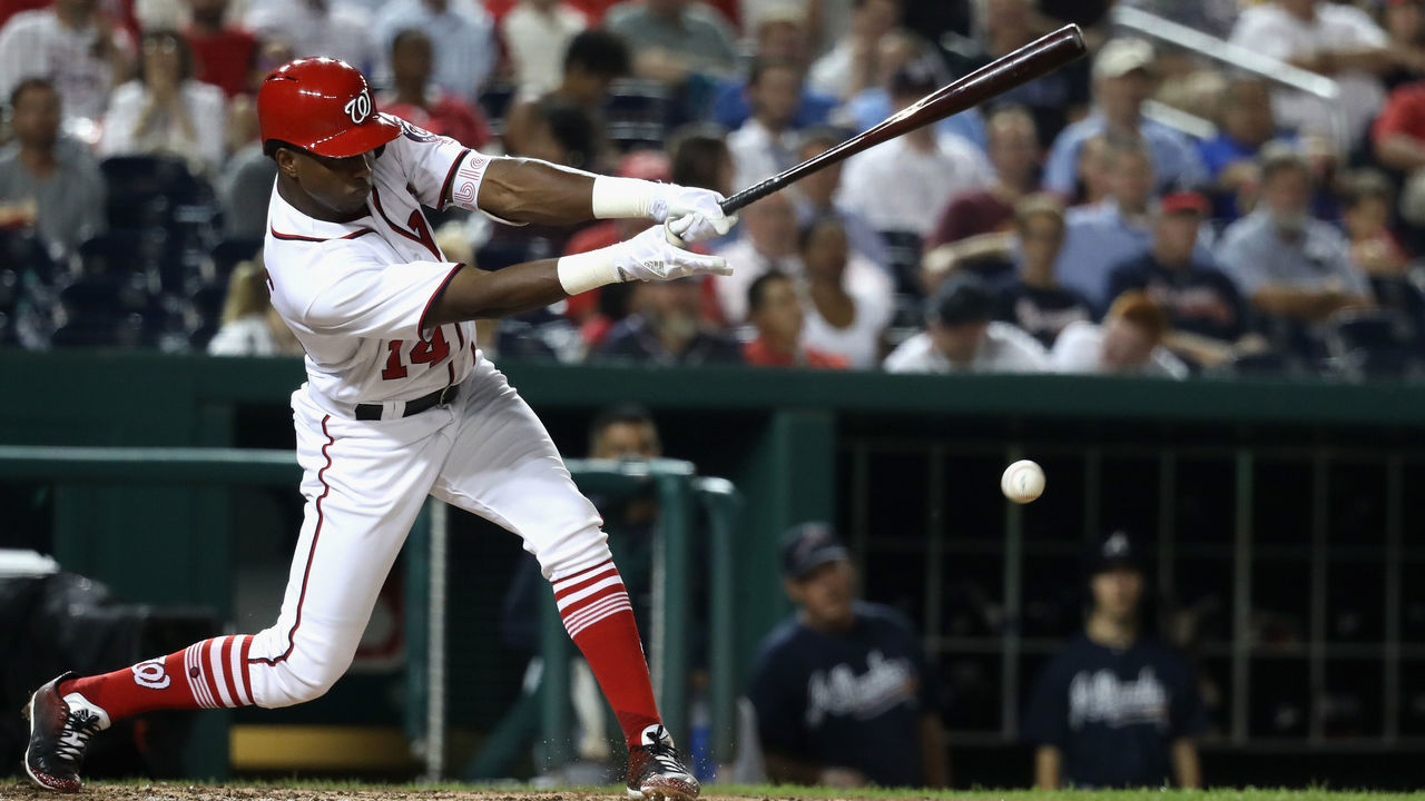 WASHINGTON, DC - SEPTEMBER 14: Victor Robles #14 of the Washington Nationals follows his infield hit against the Atlanta Braves in the sixth inninig at Nationals Park on September 14, 2017 in Washington, DC.