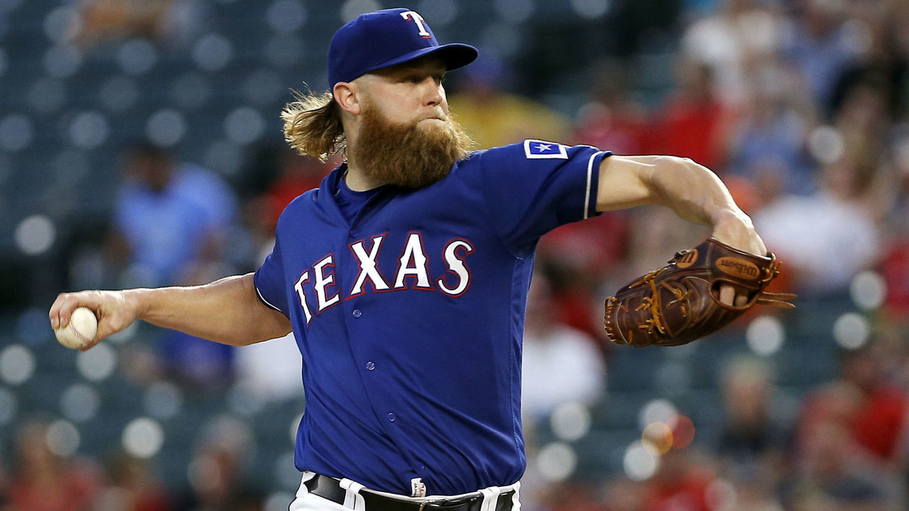 ARLINGTON, TX - SEPTEMBER 25: Starting pitcher Andrew Cashner #54 of the Texas Rangers throws during the first inning of a baseball game against the Houston Astros at Globe Life Park September 25, 2017 in Arlington, Texas.