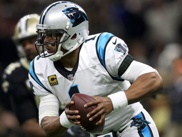 NEW ORLEANS, LA - JANUARY 07: Cam Newton #1 of the Carolina Panthers scrambles with the football against the New Orleans Saints at the Mercedes-Benz Superdome on January 7, 2018 in New Orleans, Louisiana.