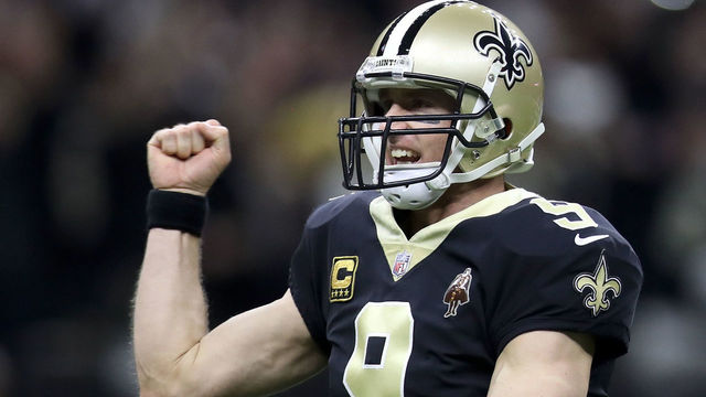 NEW ORLEANS, LA - JANUARY 07: Drew Brees #9 of the New Orleans Saints reacts after throwing a touchdown pass against the Carolina Panthers at the Mercedes-Benz Superdome on January 7, 2018 in New Orleans, Louisiana.
