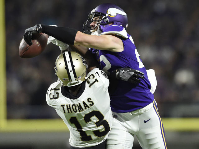 MINNEAPOLIS, MN - SEPTEMBER 11: Harrison Smith #22 of the Minnesota Vikings bats the ball away from Michael Thomas #13 of the New Orleans Saints in the second half of the game on September 11, 2017 at U.S. Bank Stadium in Minneapolis, Minnesota.