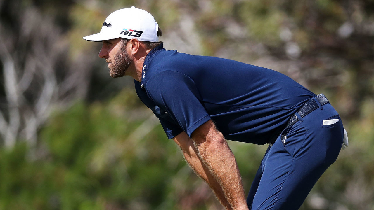 LAHAINA, HI - JANUARY 07: Dustin Johnson of the United States lines up a putt on the fourth green during the final round of the Sentry Tournament of Champions at Plantation Course at Kapalua Golf Club on January 7, 2018 in Lahaina, Hawaii.