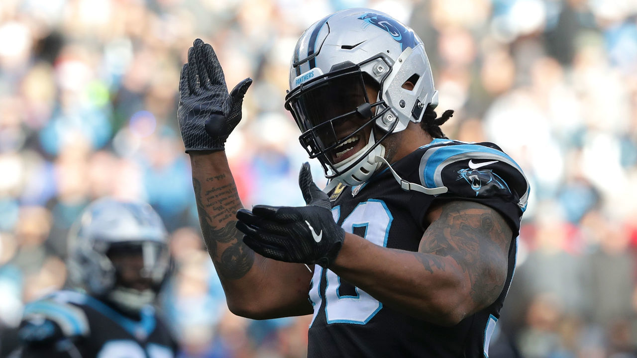CHARLOTTE, NC - DECEMBER 24: Julius Peppers #90 of the Carolina Panthers reacts after a play against the Tampa Bay Buccaneers during their game at Bank of America Stadium on December 24, 2017 in Charlotte, North Carolina.