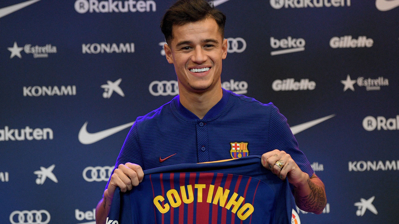BARCELONA, SPAIN - JANUARY 08: New Barcelona signing Philippe Coutinho poses for a photograph with his new shirt as he is unveiled at Camp Nou on January 8, 2018 in Barcelona, Spain. The Brazilian player signed from Liverpool, has agreed a deal with the Catalan club until 2023 season.