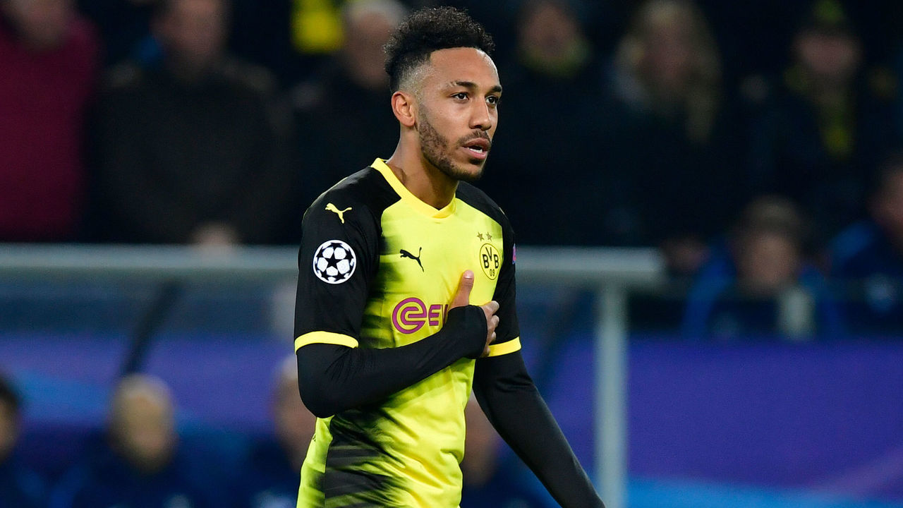 Dortmund's Gabonese forward Pierre-Emerick Aubameyang celebrates scoring the opening goal during the UEFA Champions League Group H football match BVB Borussia Dortmund v Tottenham Hotspur at the BVB Stadion on November 21, 2017 in Dortmund, western Germany. / AFP PHOTO / John MACDOUGALL