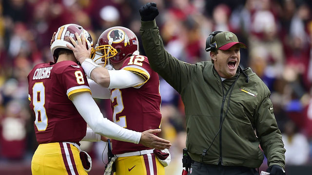 LANDOVER, MD - NOVEMBER 12: Quarterback Kirk Cousins #8 of the Washington Redskins, Colt McCoy #12 of the Washington Redskins and head coach Jay Gruden of the Washington Redskins celebrate a touchdown that was reviewed during the first quarter against the Minnesota Vikings at FedExField on November 12, 2017 in Landover, Maryland.