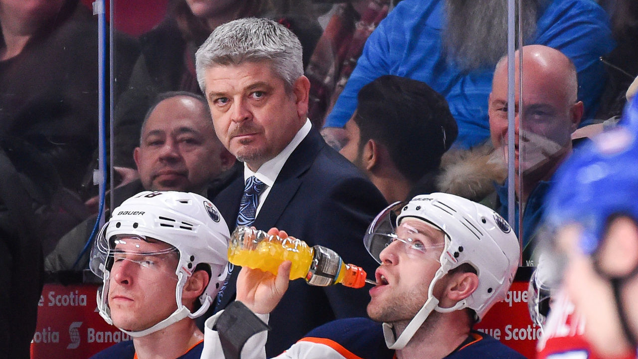 MONTREAL, QC - DECEMBER 09: Head coach of the Edmonton Oilers Todd McLellan looks on from behind the bench against the Montreal Canadiens during the NHL game at the Bell Centre on December 9, 2017 in Montreal, Quebec, Canada. The Edmonton Oilers defeated the Montreal Canadiens 6-2.